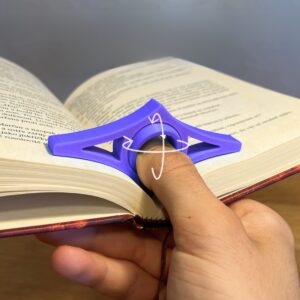 Book Page Holder with Rotating Thumb Piece